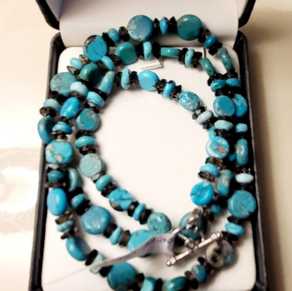 Solid sterling silver African smokey quarts with beautiful raw turquoise